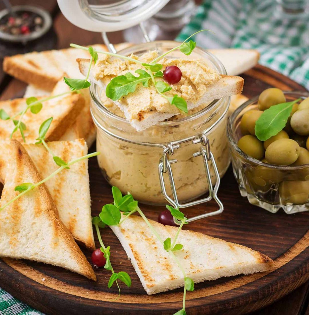 pate-chicken-rillette-toast-olives-and-herbs-on-a-PPKESHL.jpg