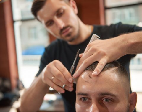 young-man-at-the-barbershop-SQDLUPM