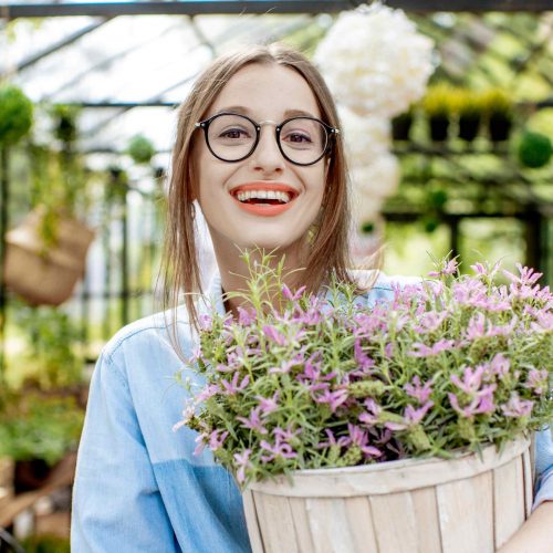 woman-with-lavender-in-the-greenhouse-6E6RDA7